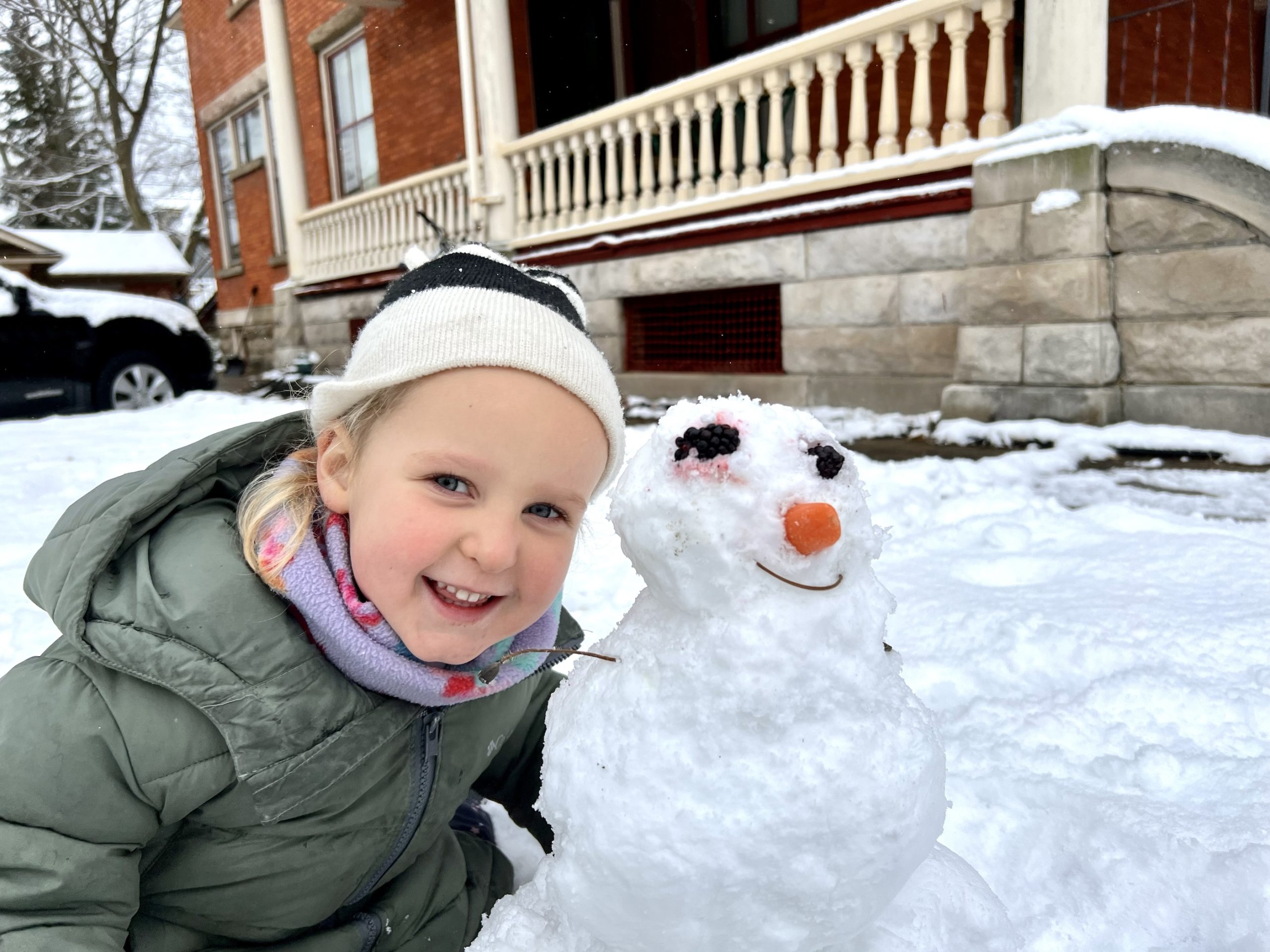 Margo makes a snowman